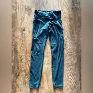 Girls Athleta Stash Your Treasures Leggings size L- teal color